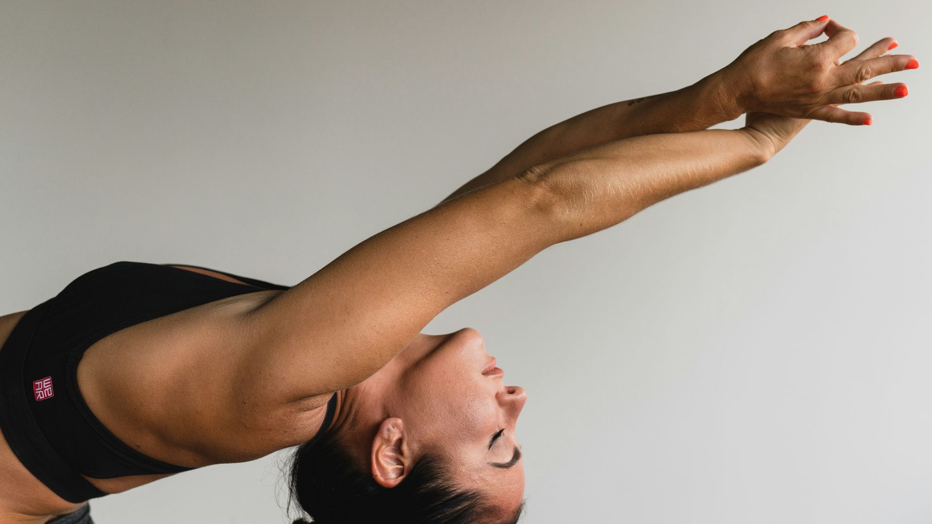 woman stretching arms