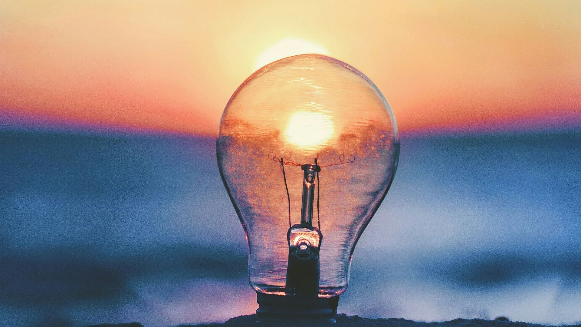 selective focus photography of light bulb