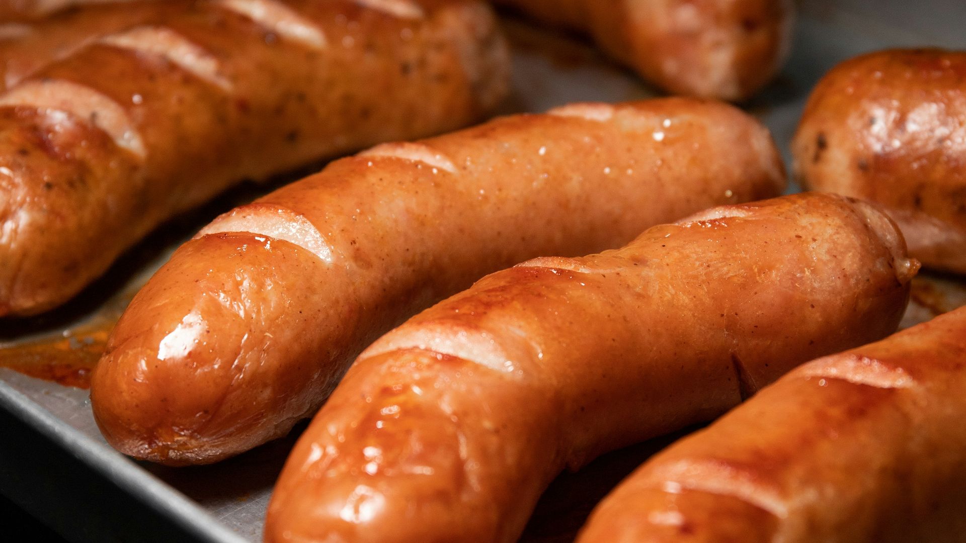 sausage on white ceramic plate