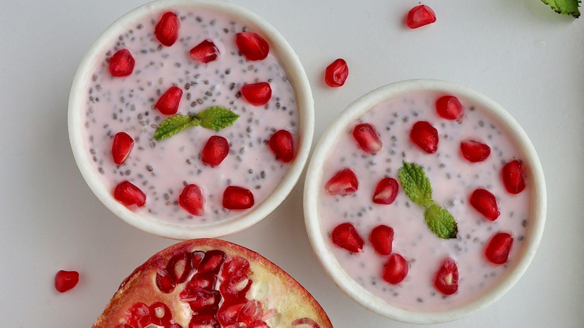 sliced strawberries on white ceramic bowl