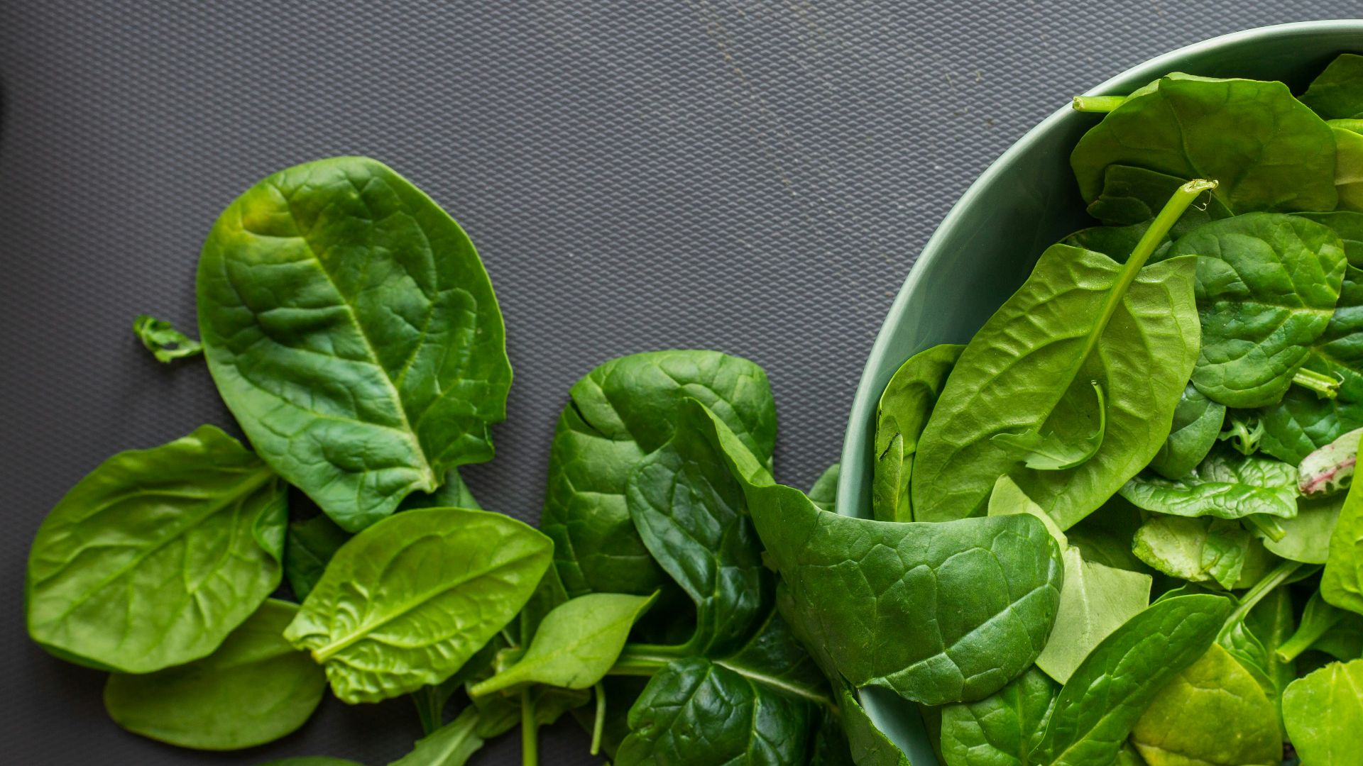 green leaves on white ceramic bowl