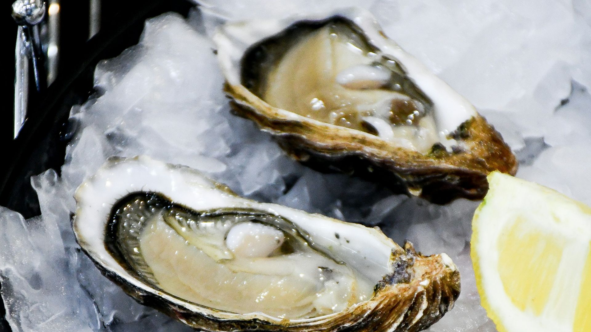 sliced fruit on black ceramic plate