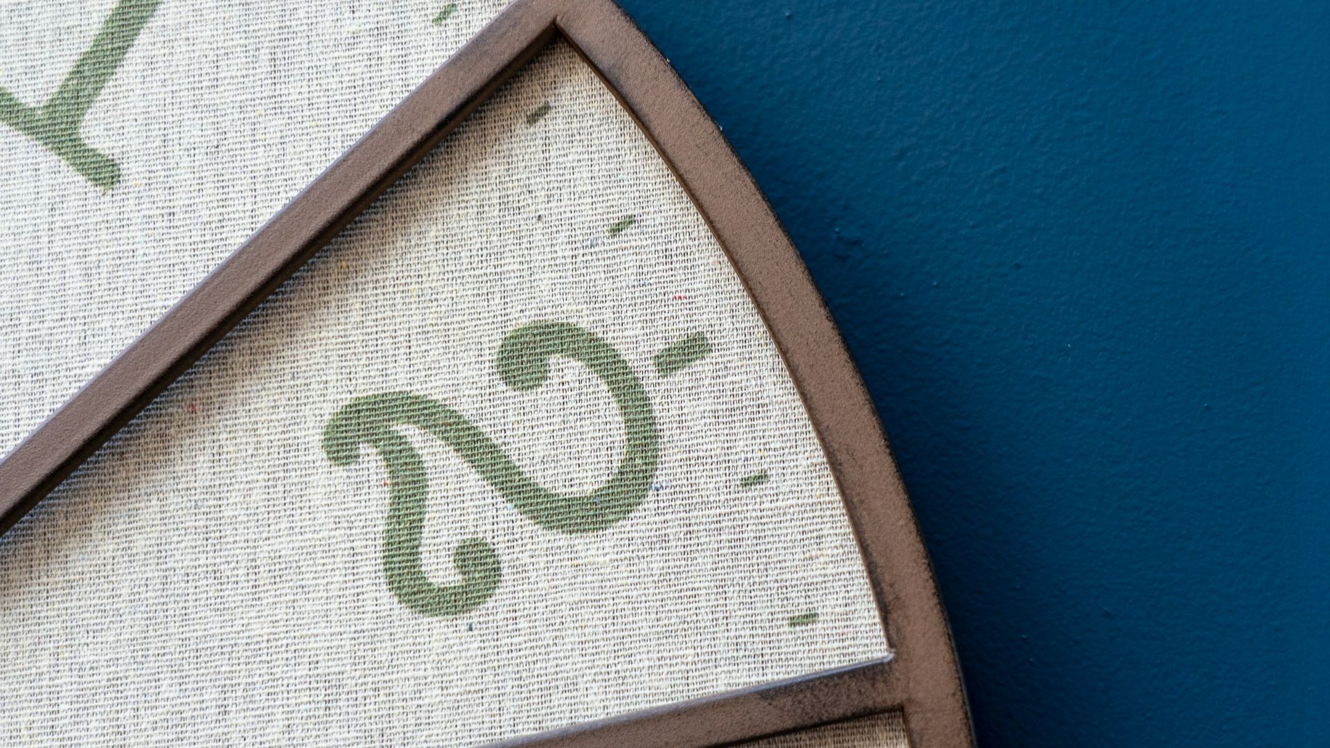 brown wooden analog wall clock