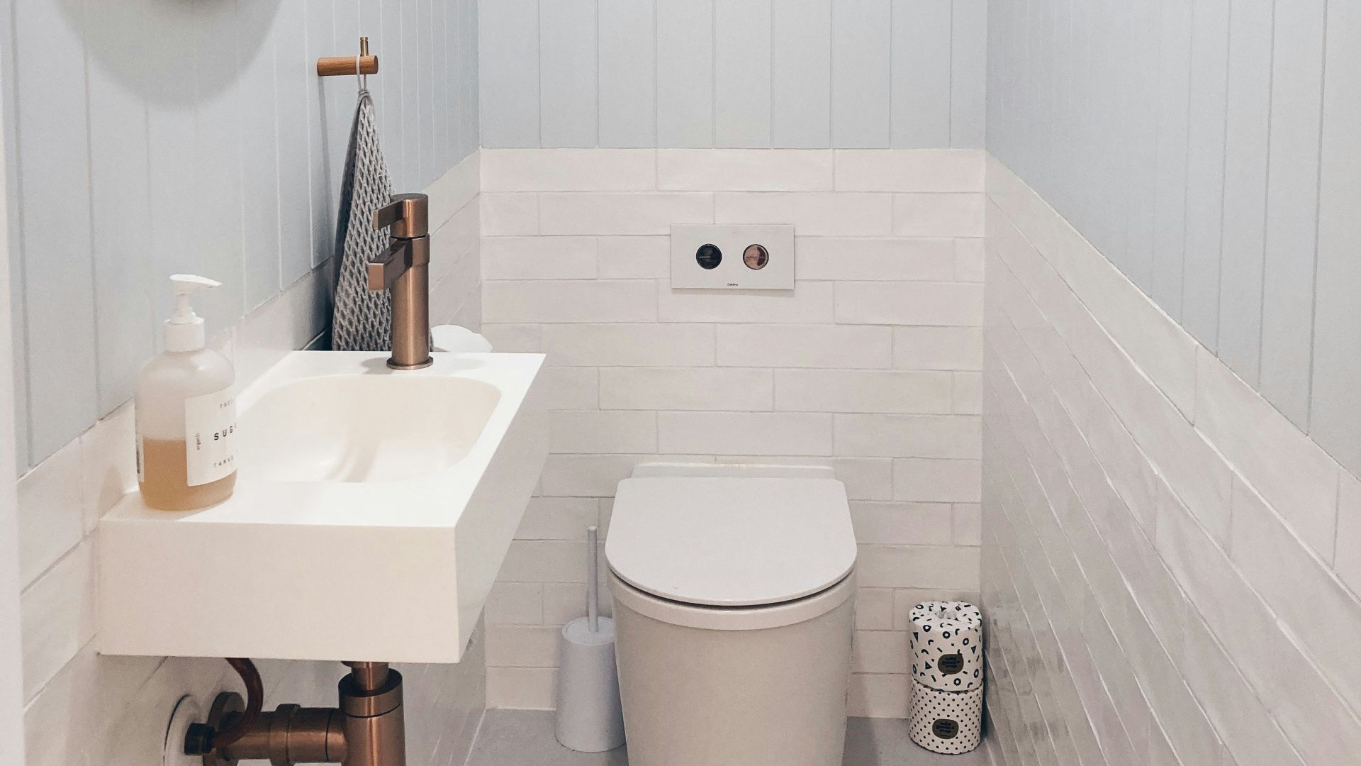 white ceramic sink with stainless steel faucet