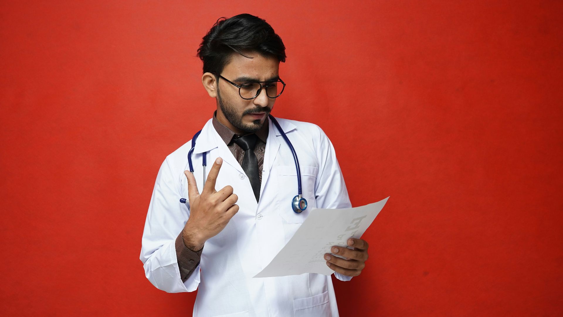 a doctor holding a clipboard