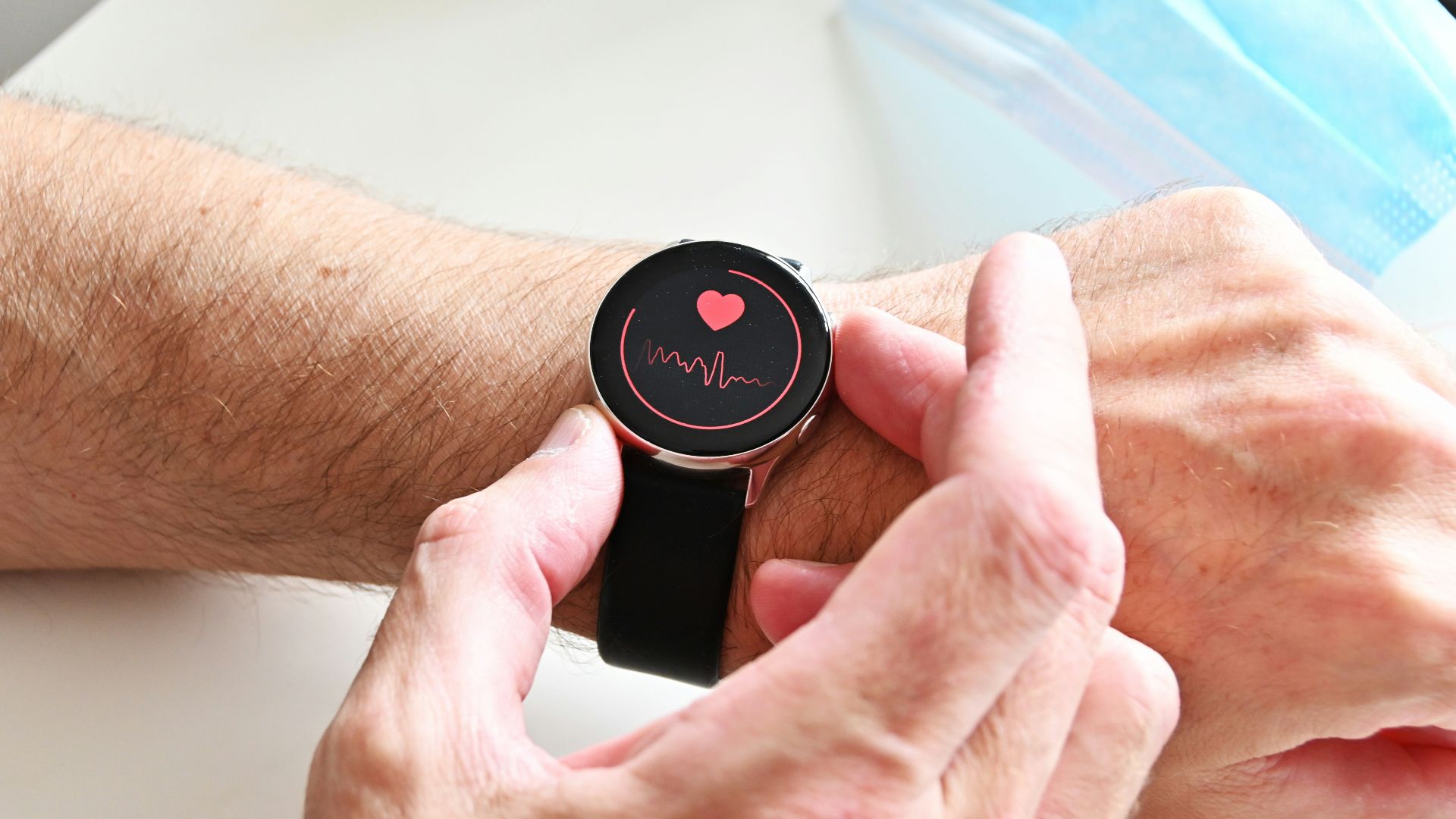 a person holding a stopwatch