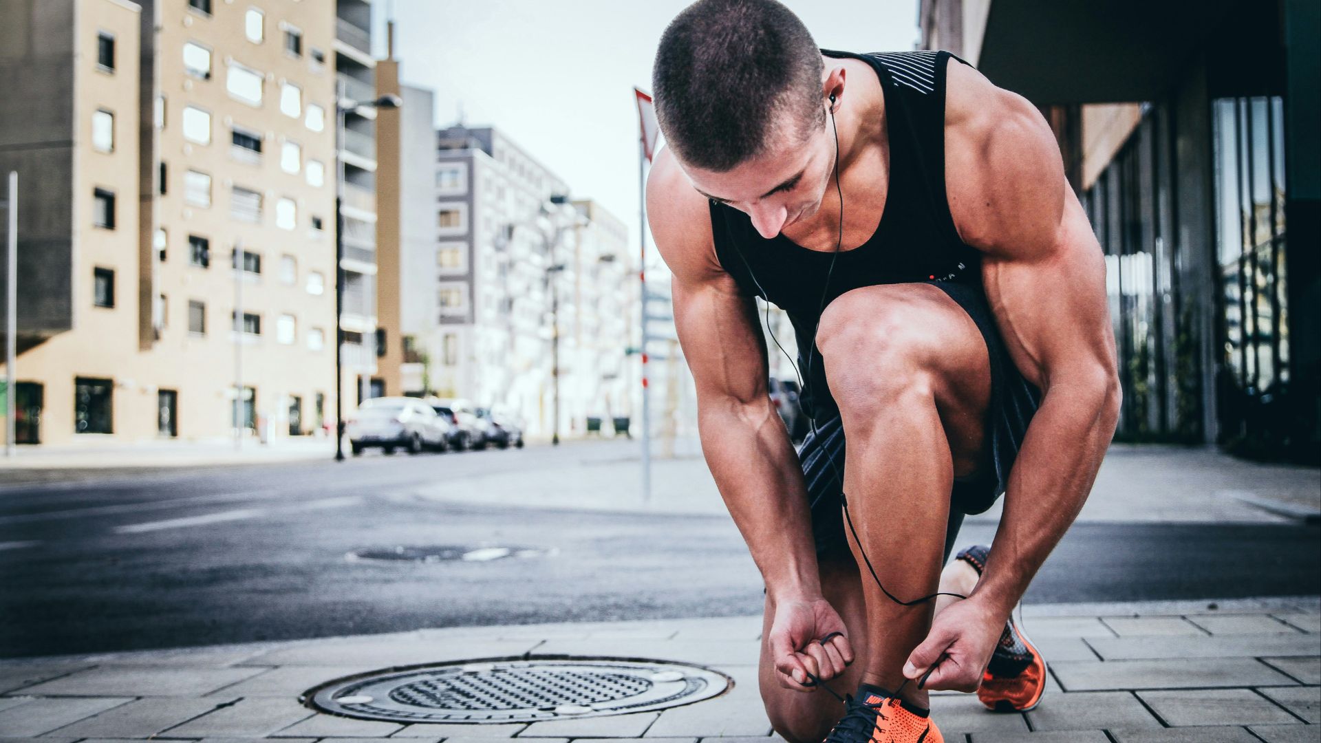 man tying his shoes
