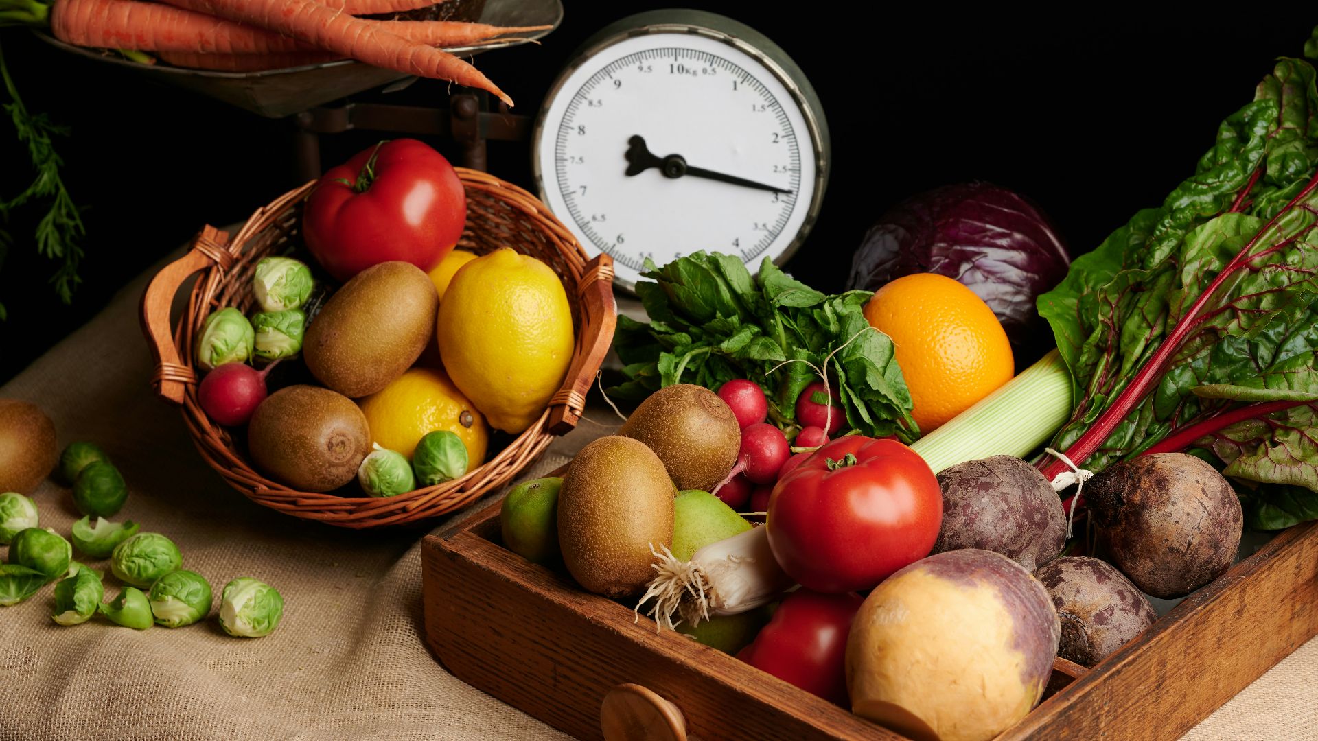 a wooden box filled with lots of different types of vegetables