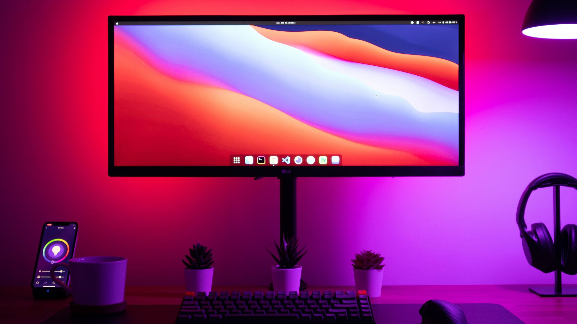 black flat screen computer monitor turned on beside black computer keyboard