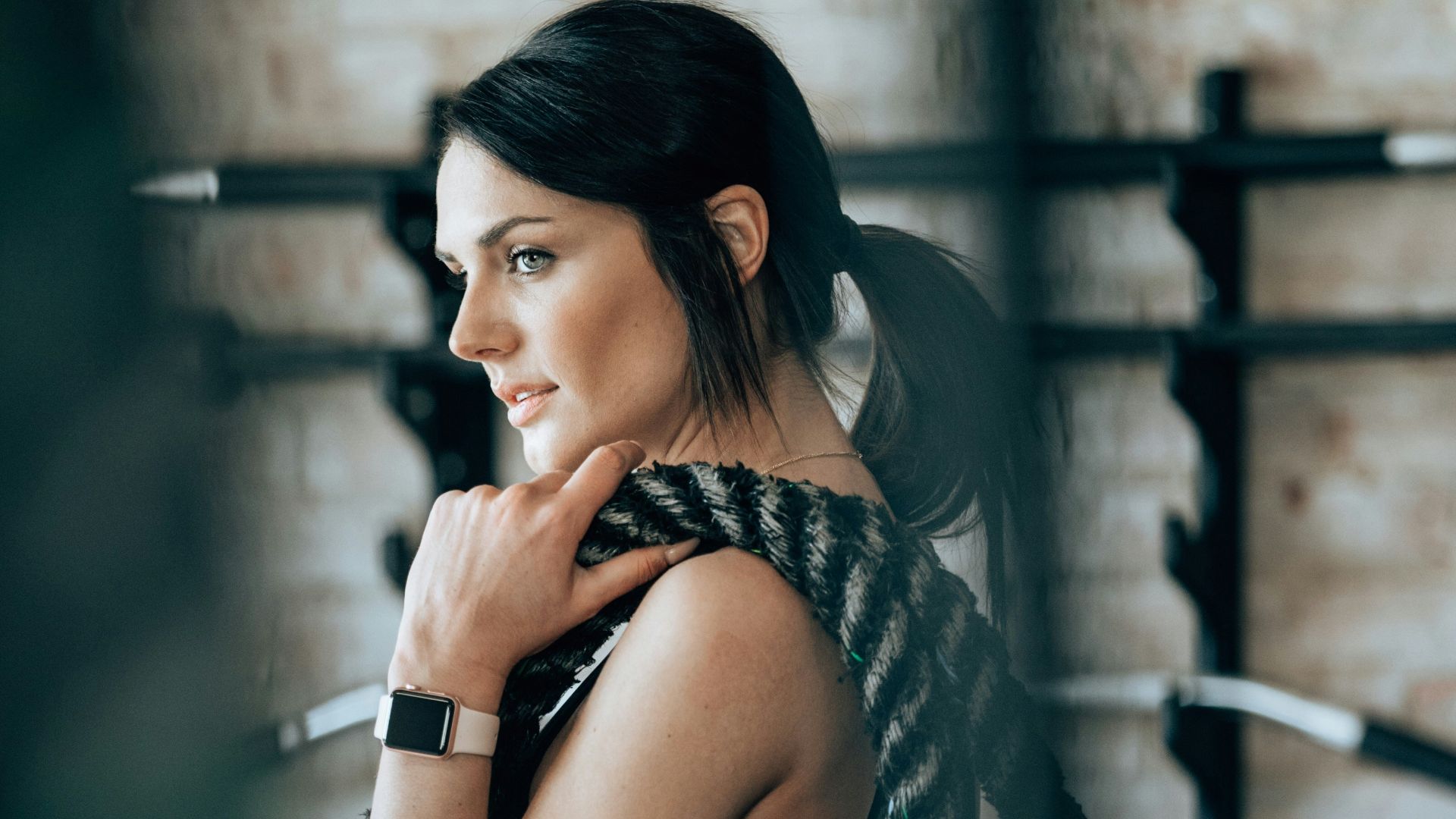 woman holding black rope