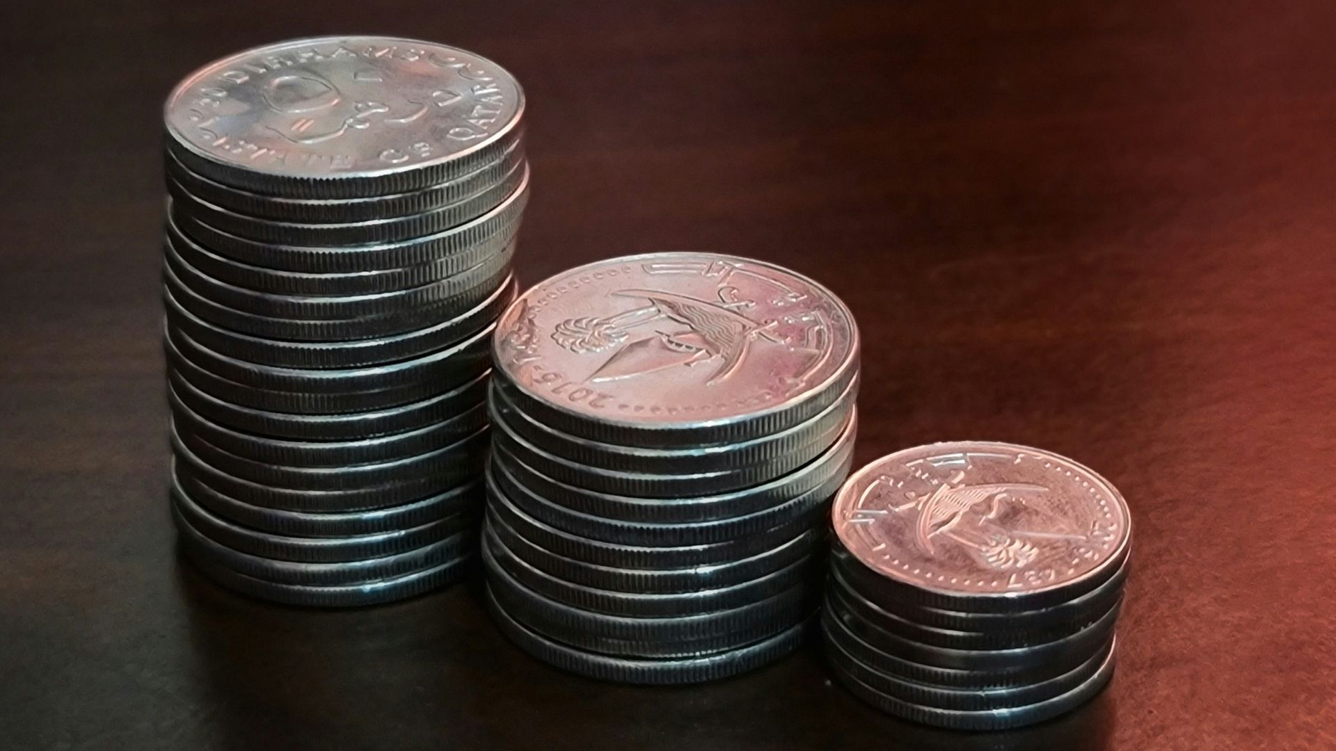 silver round can on brown wooden table