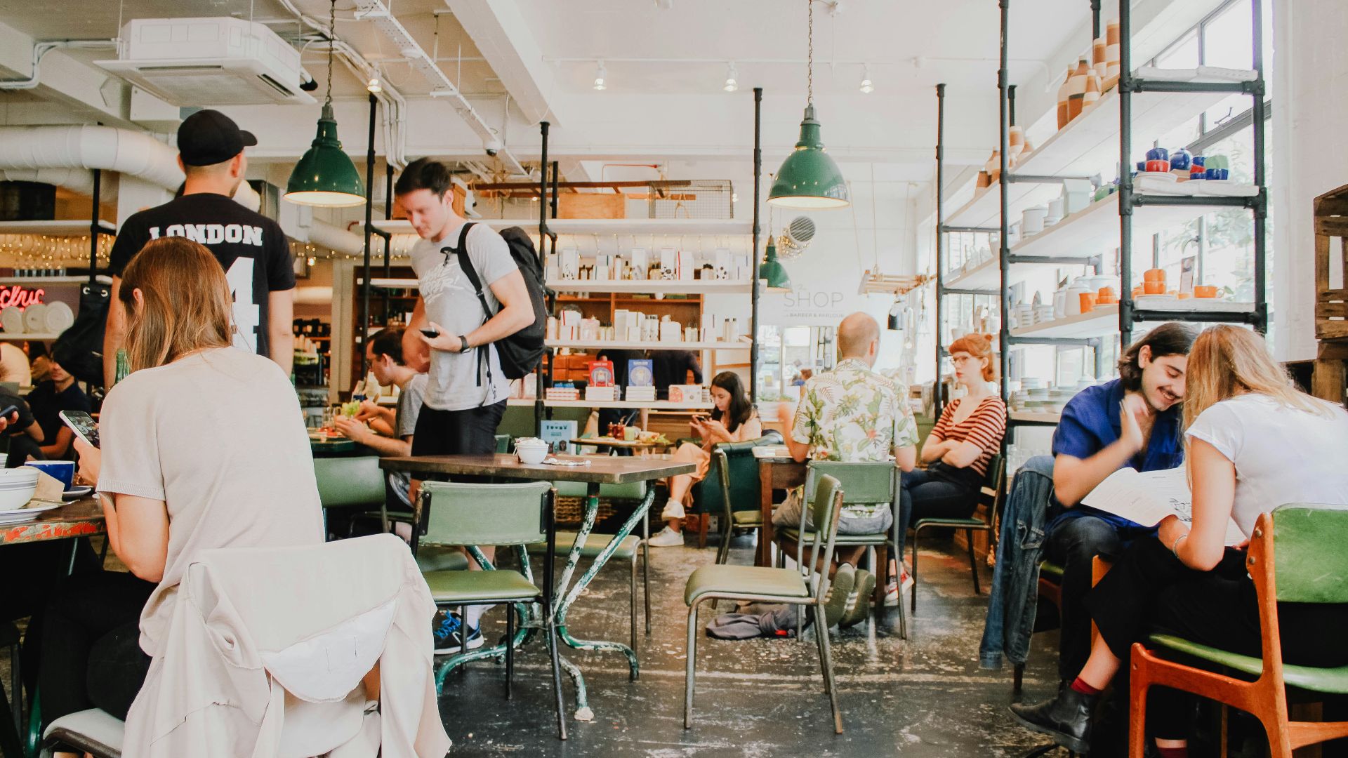 people eating inside of cafeteria during daytime
