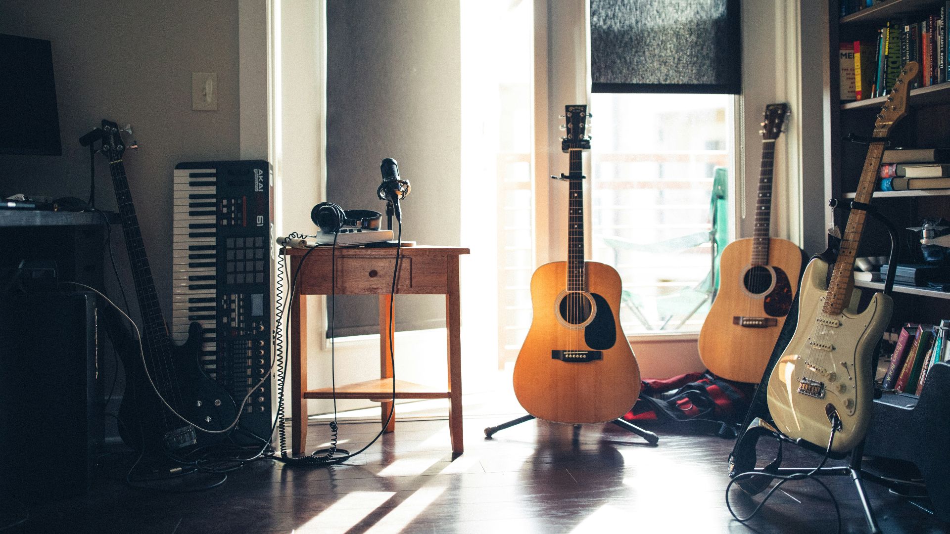 several guitars beside of side table