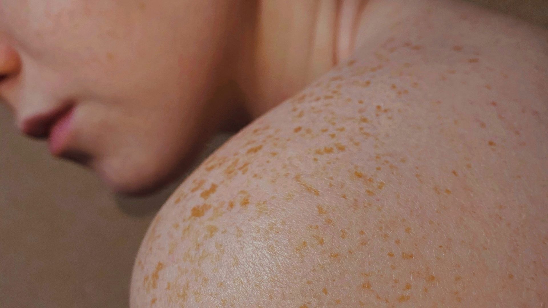 topless woman with brown hair