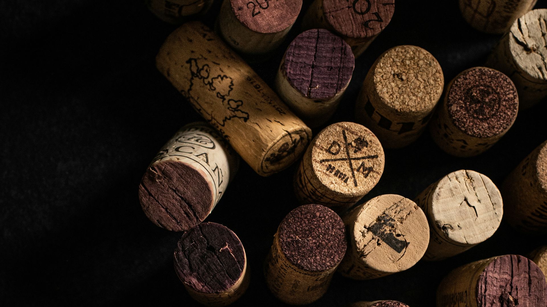 a bunch of wine corks sitting on top of a table