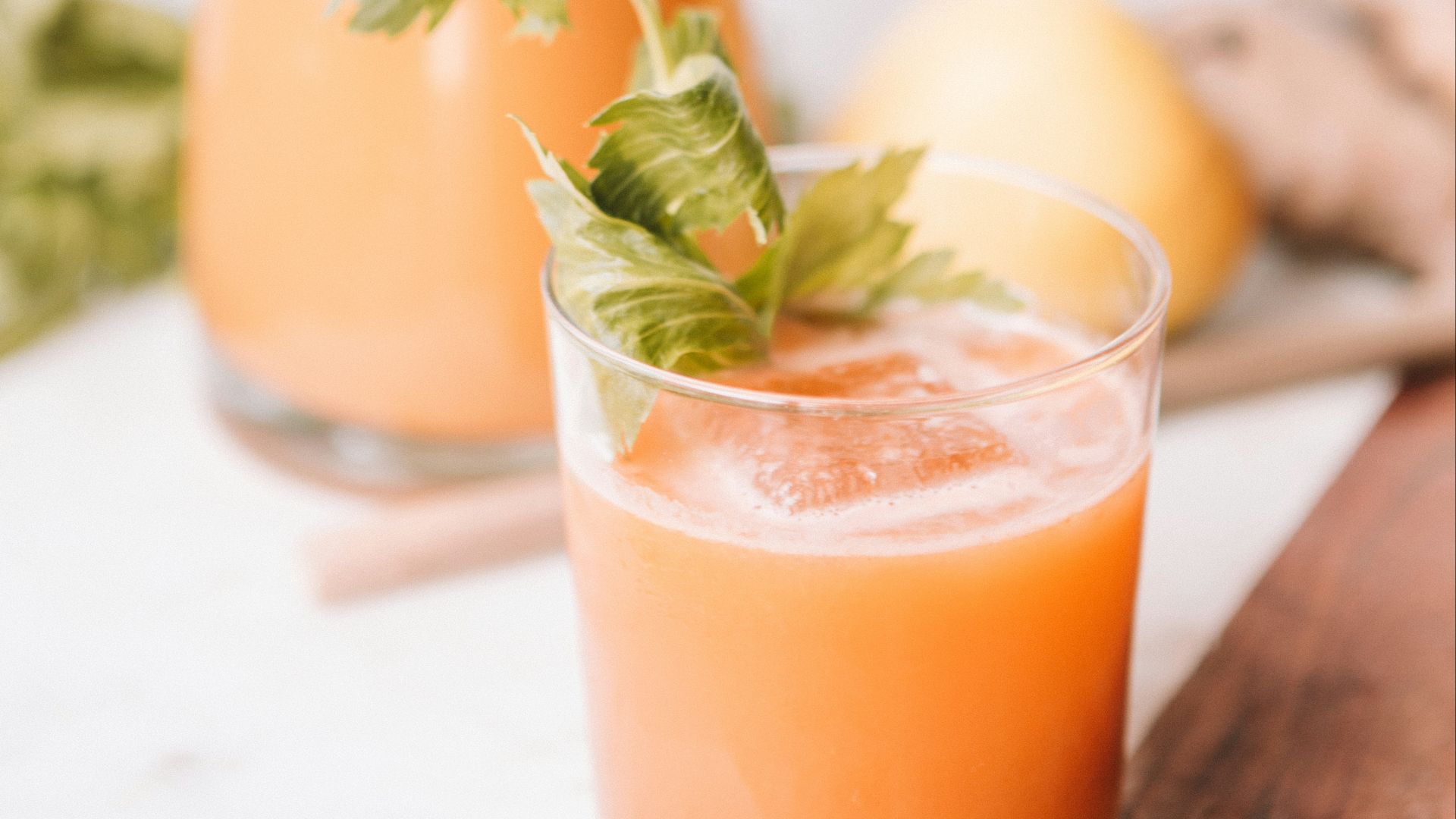 clear glass pitcher beside clear rocks glass