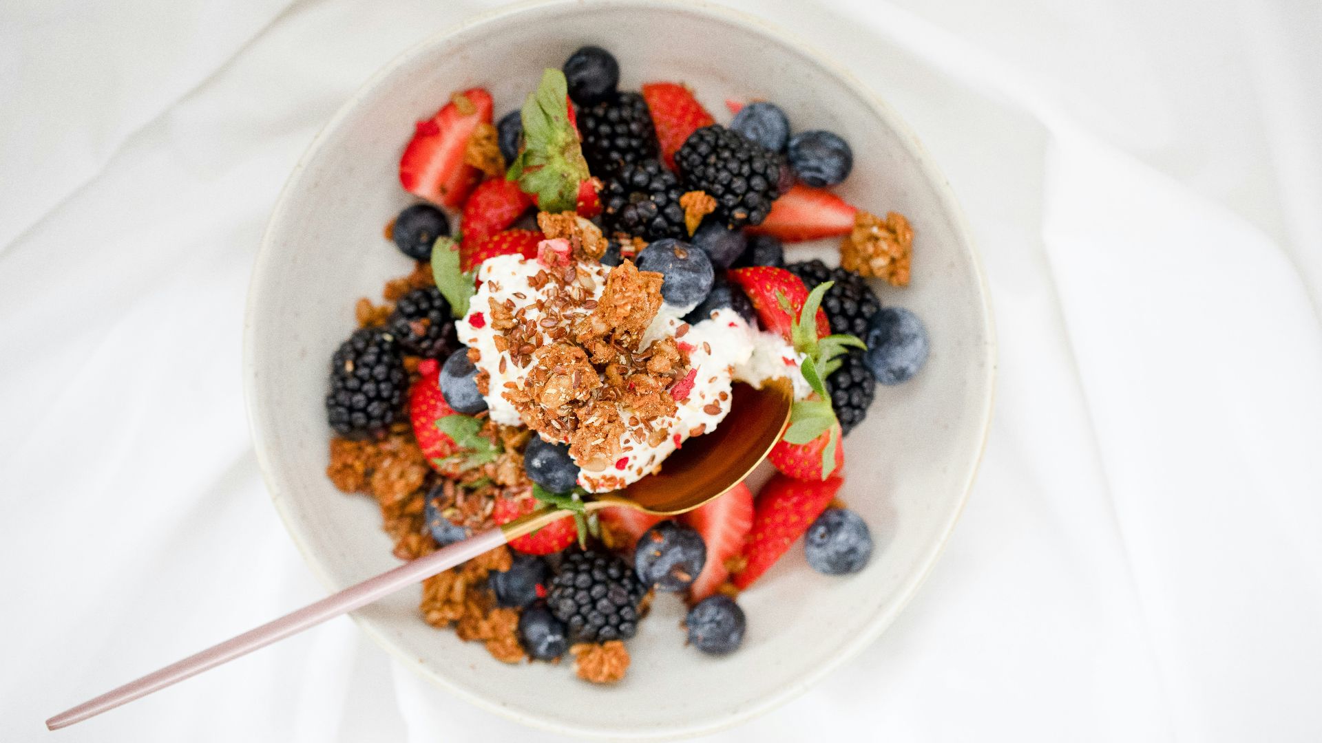 fruit salad on white ceramic bowl