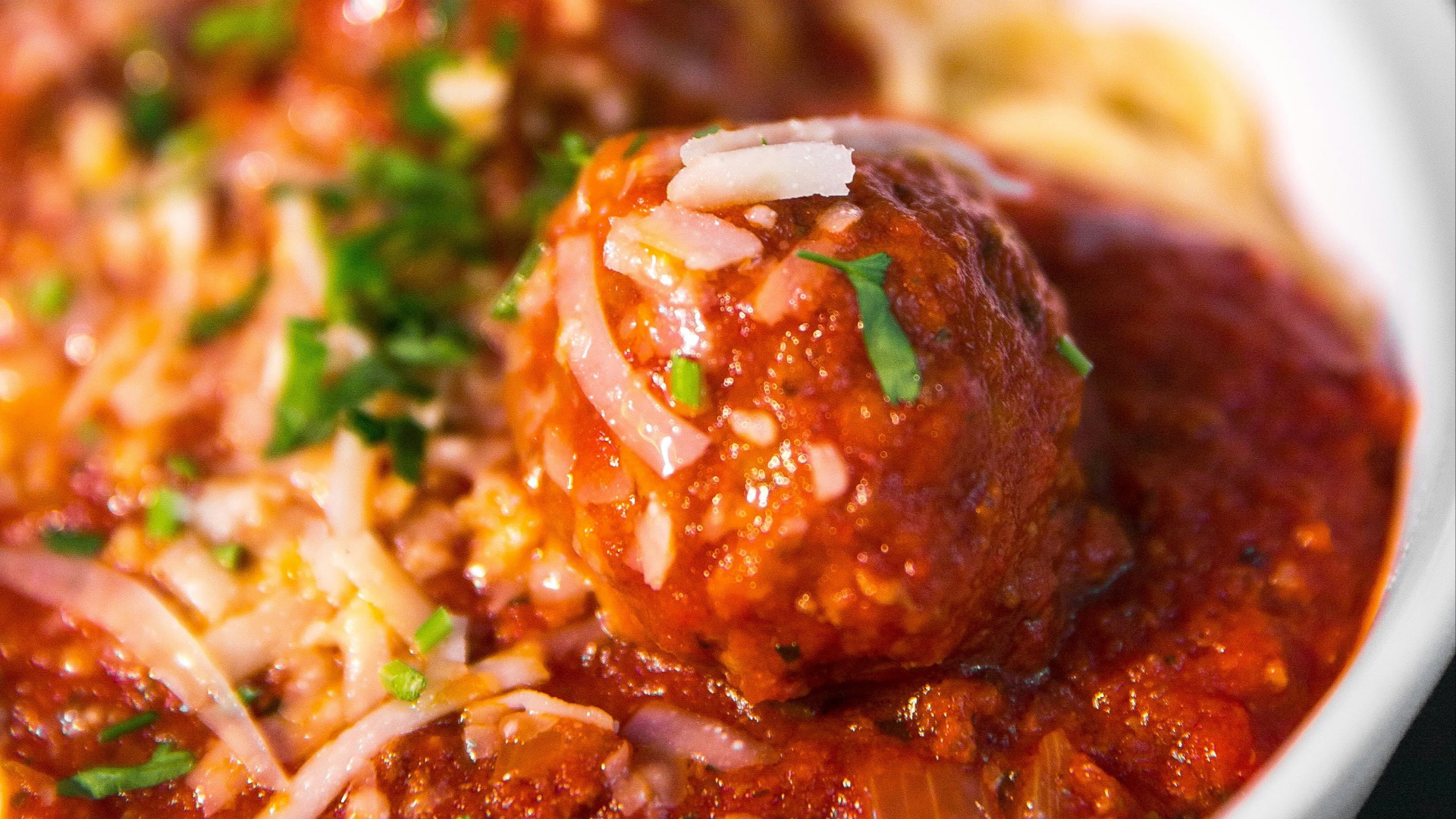 meta balls with noodles served on white ceramic bowl
