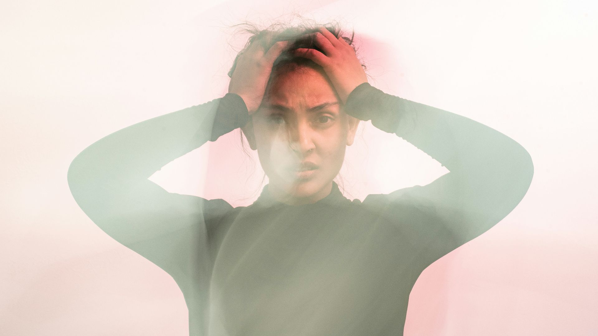 woman in gray turtleneck long sleeve shirt