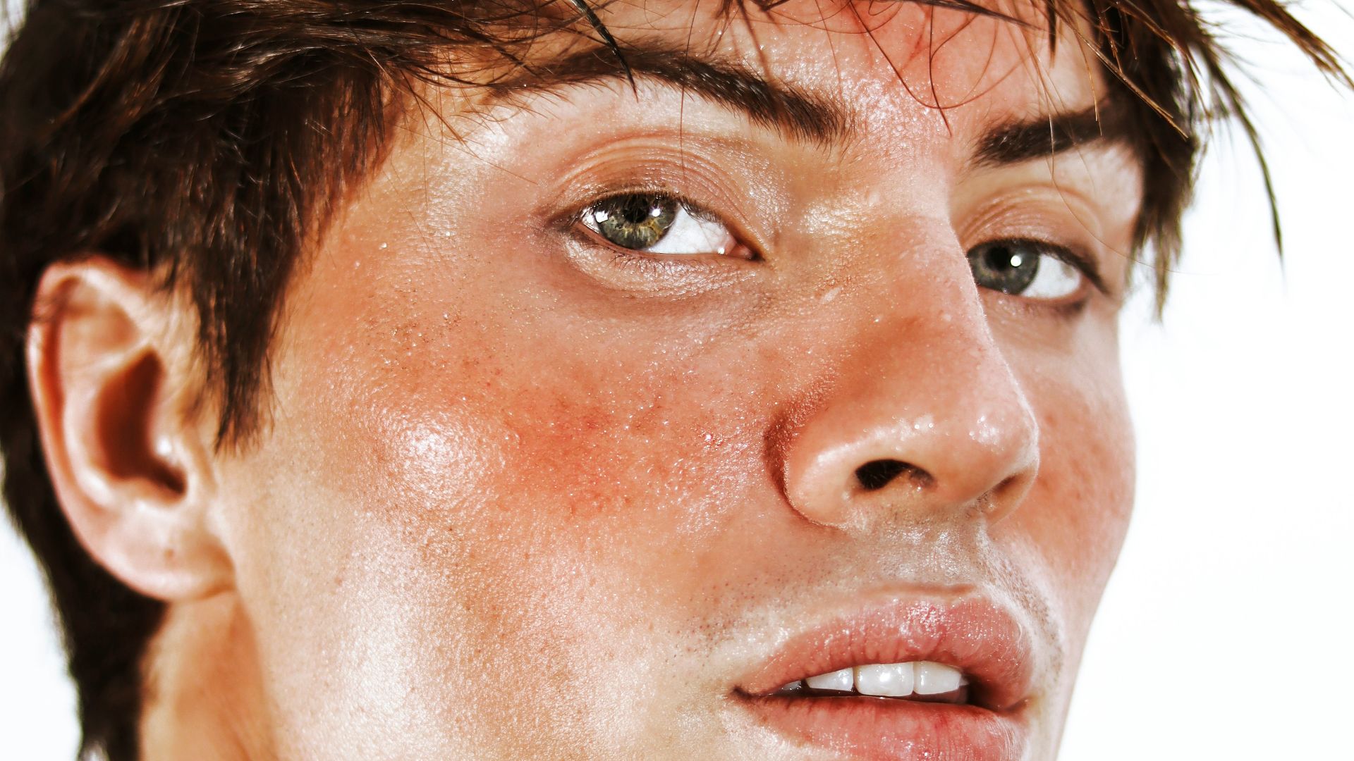 A close up of a person wearing a necklace