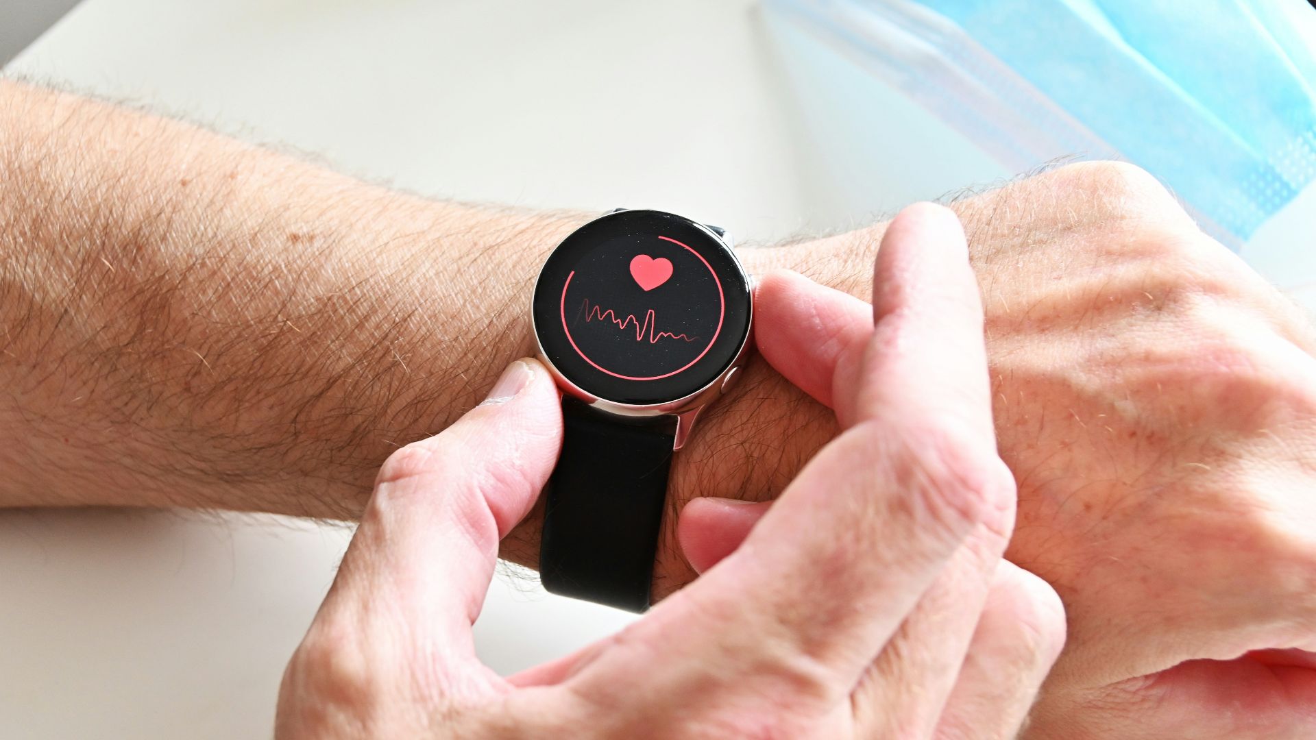 a person holding a stopwatch