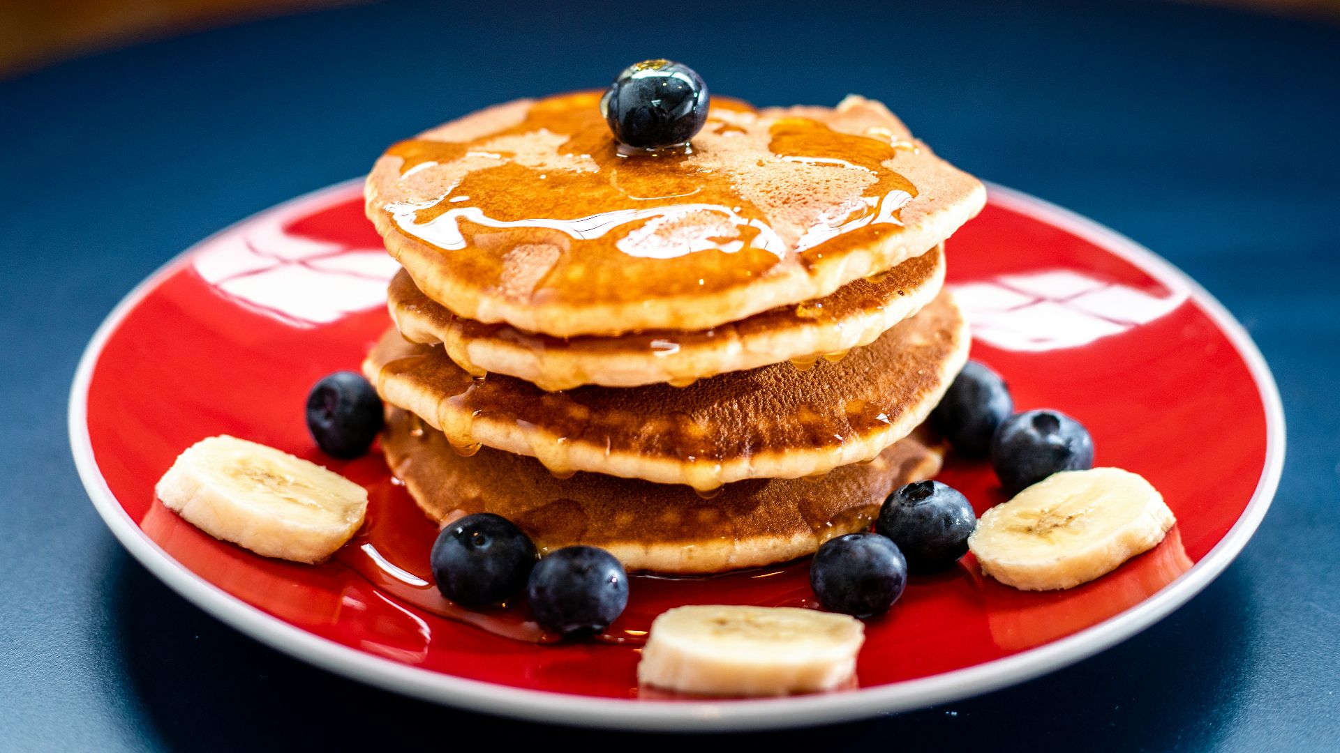 baked pancake with blueberry and slice of banan