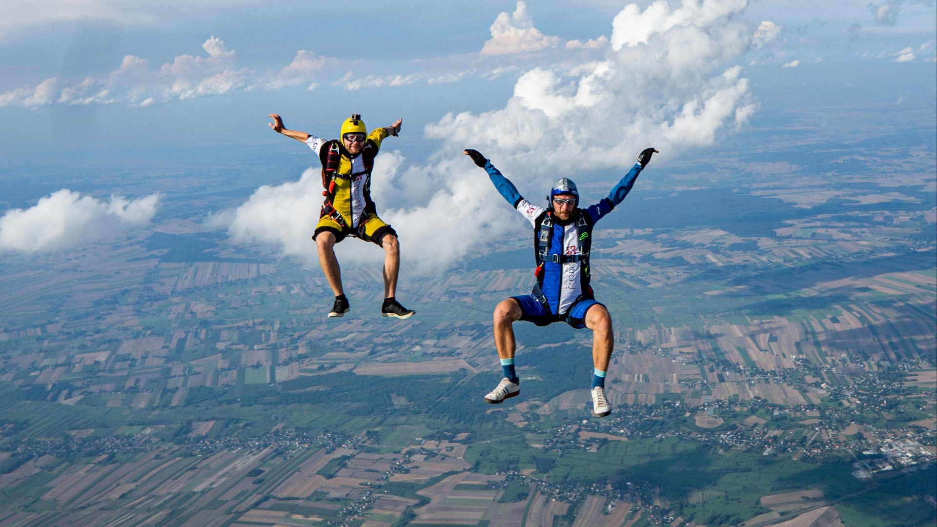 2 men jumping on air