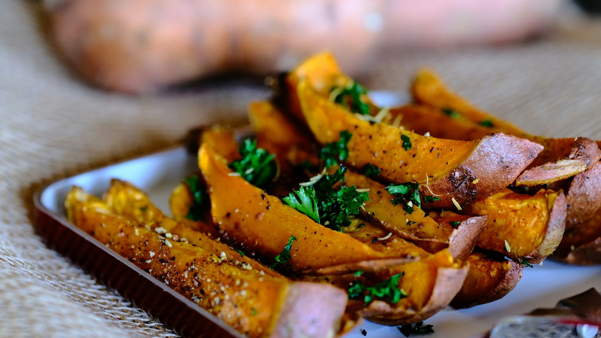 sliced vegetable on brown wooden chopping board