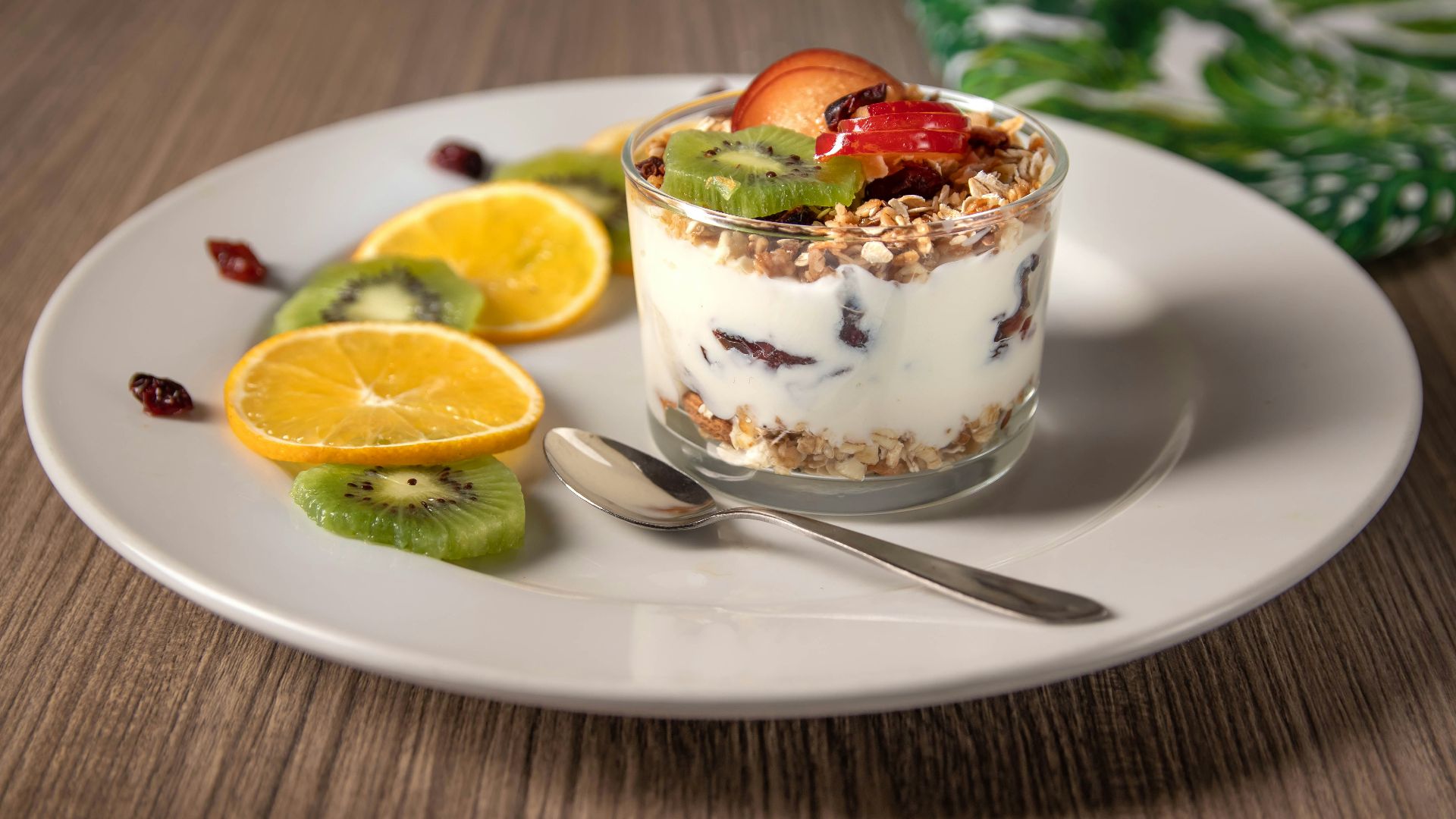 ice cream with sliced lemon on white ceramic plate
