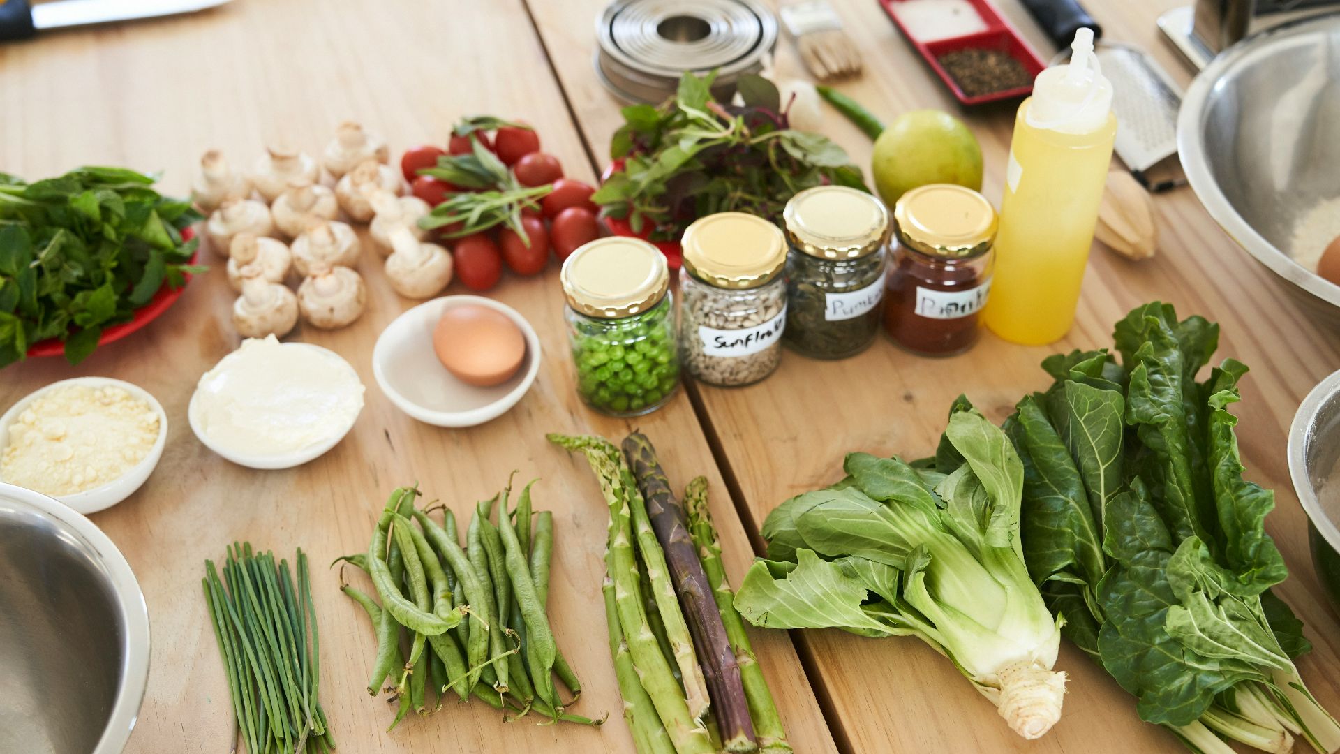 green vegetable on brown wooden table