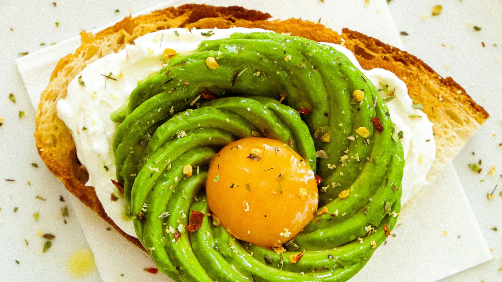 green vegetable on brown bread