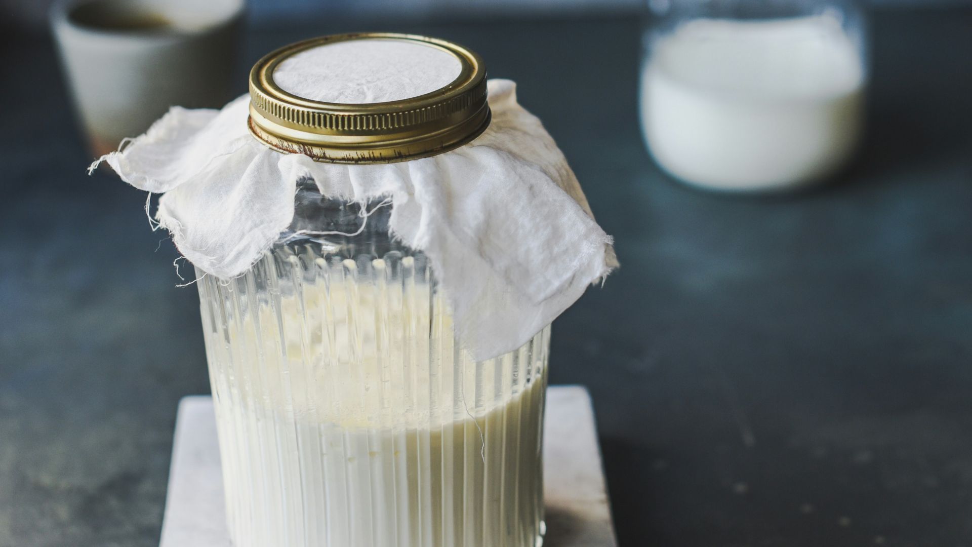 clear glass jar with white liquid