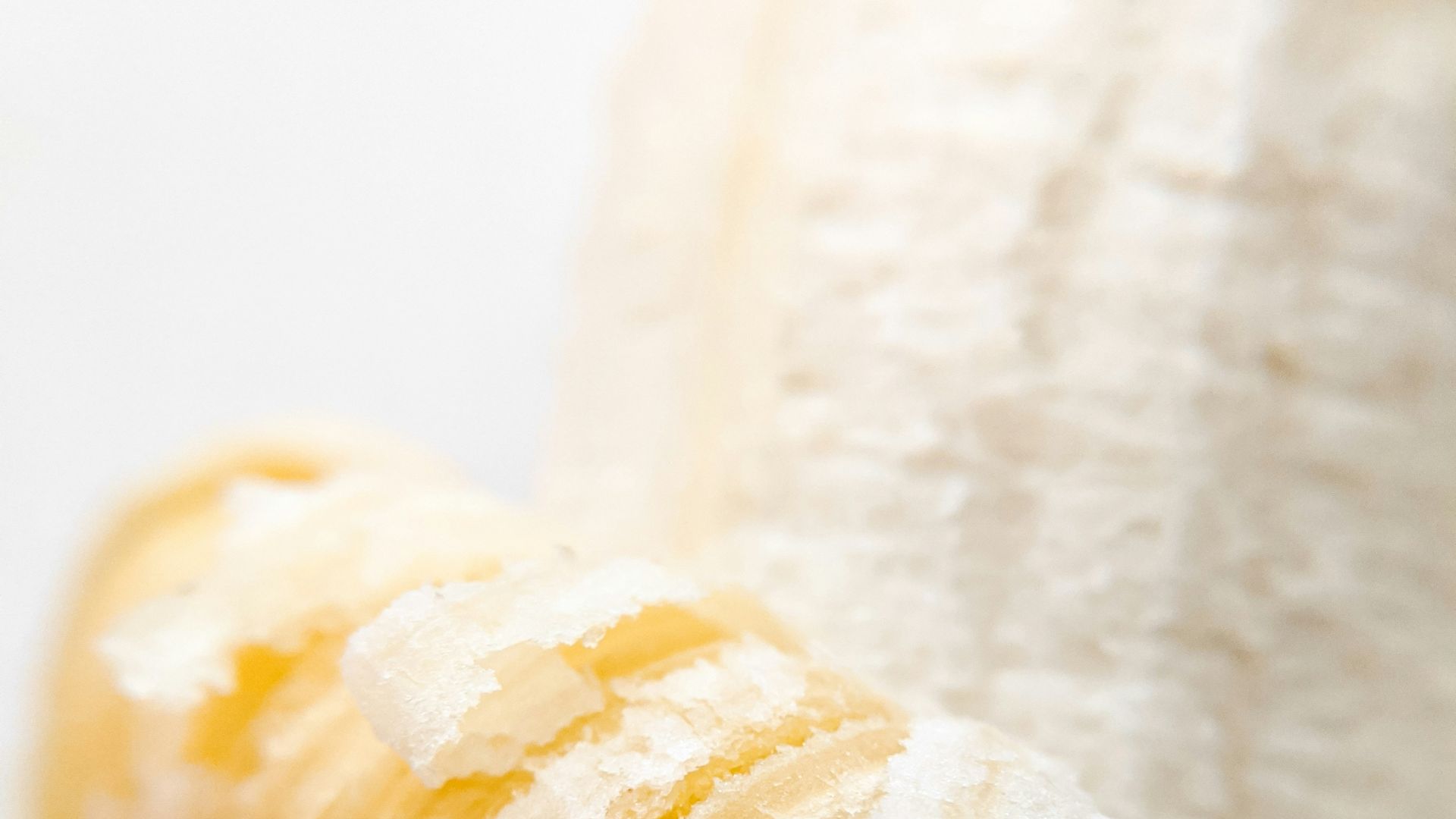 yellow banana peel on white surface