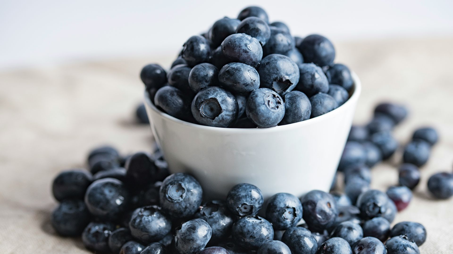 blueberries on white ceramic container