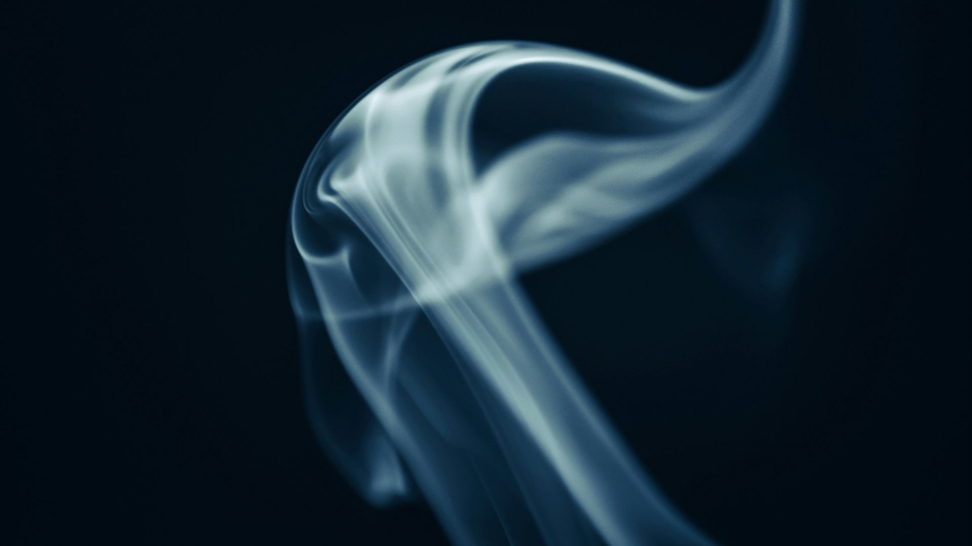 a blue smoke texture on a black background
