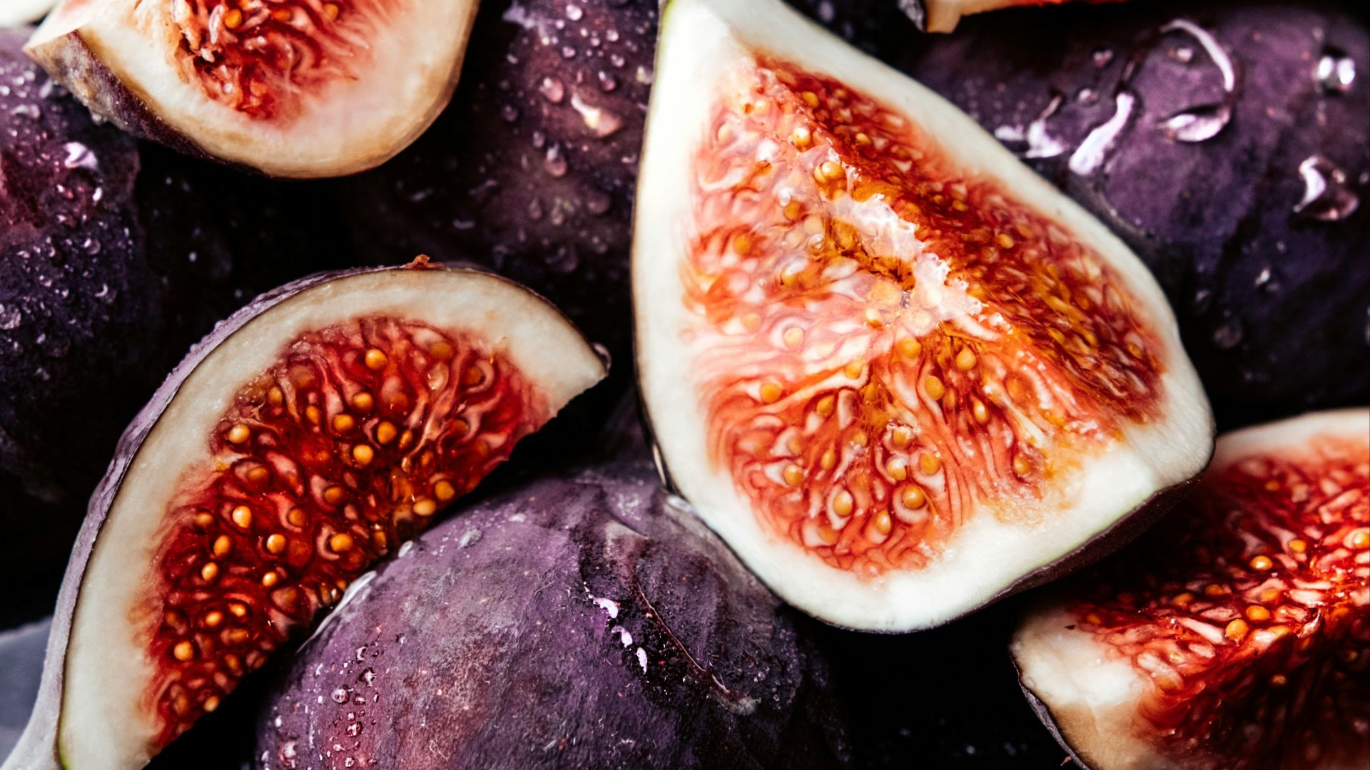a bunch of figs that are sitting on a table