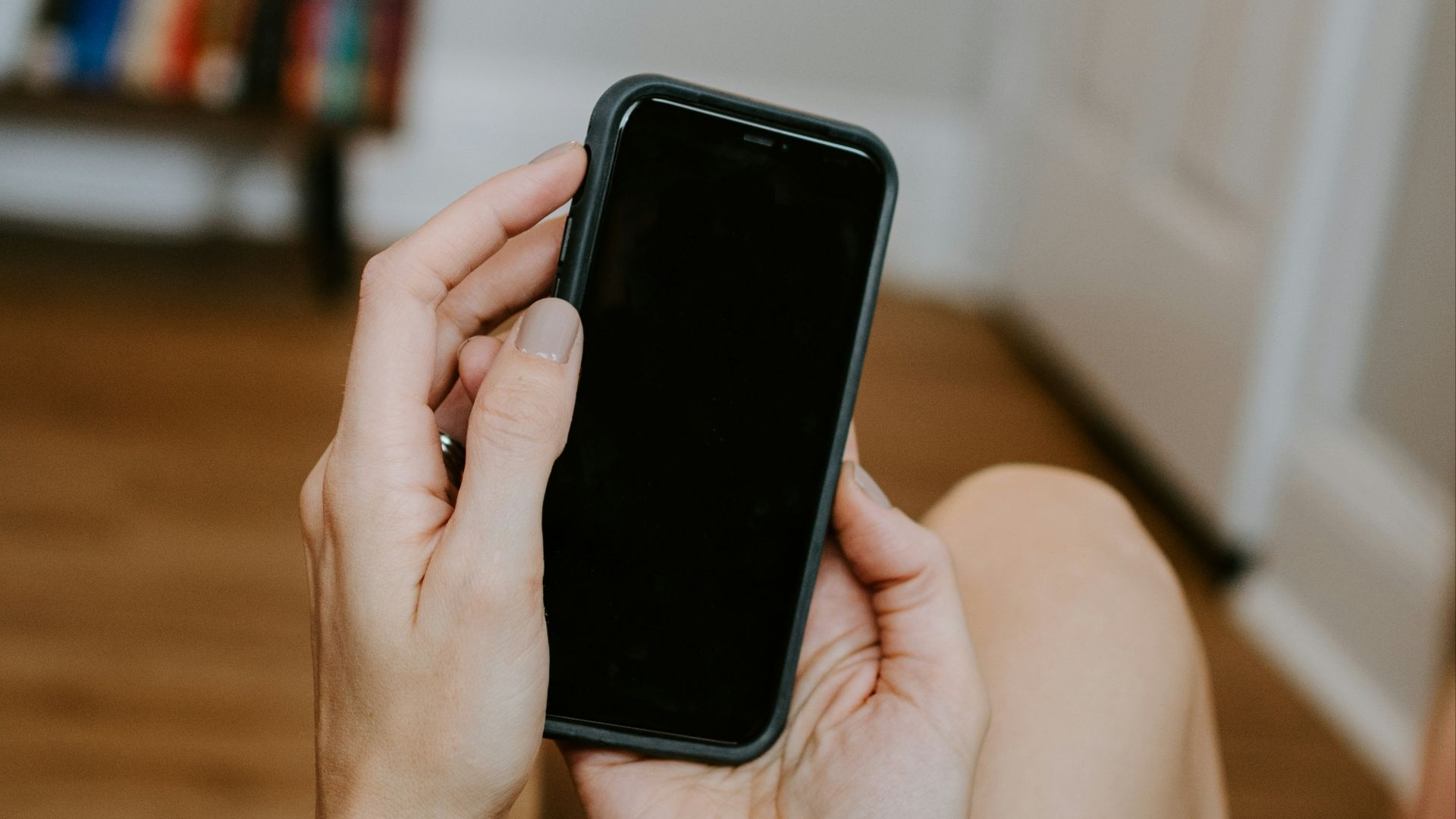 person holding black android smartphone