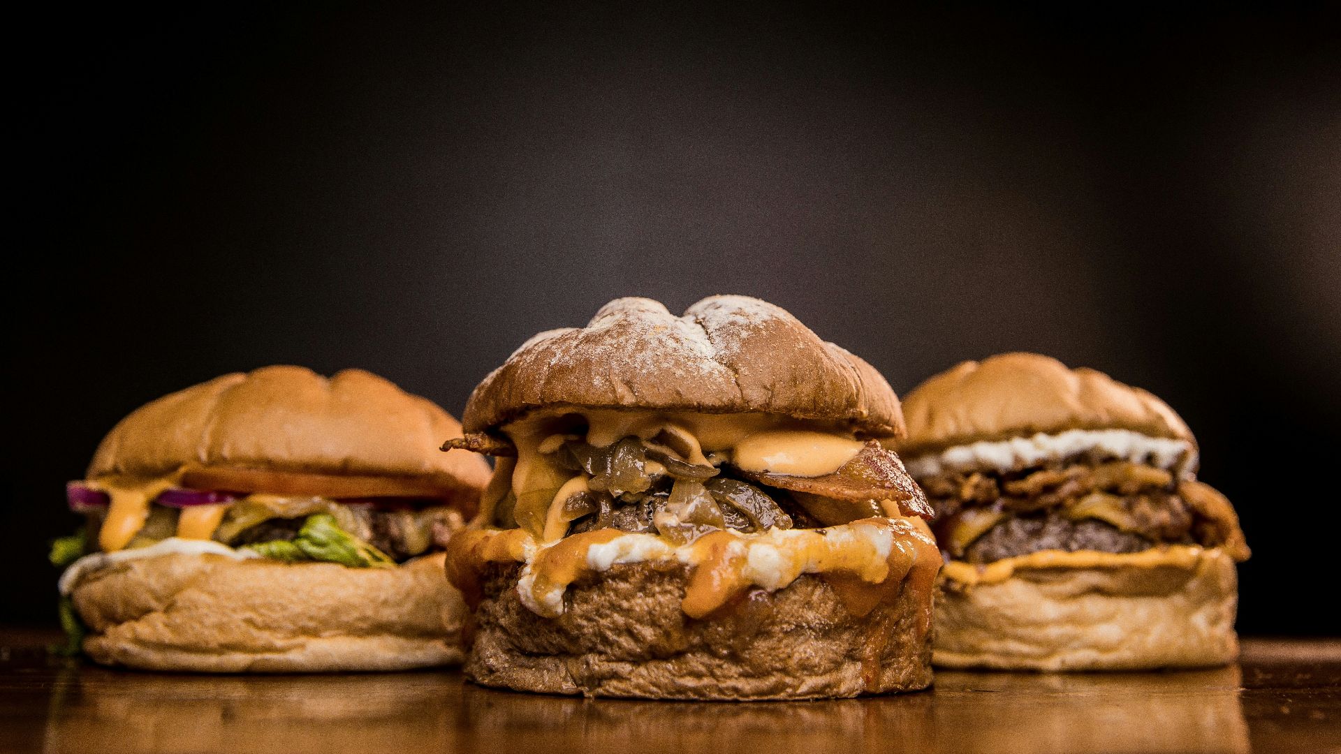 burger on brown wooden table