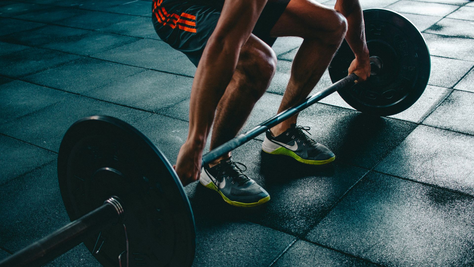 person about to lift the barbel