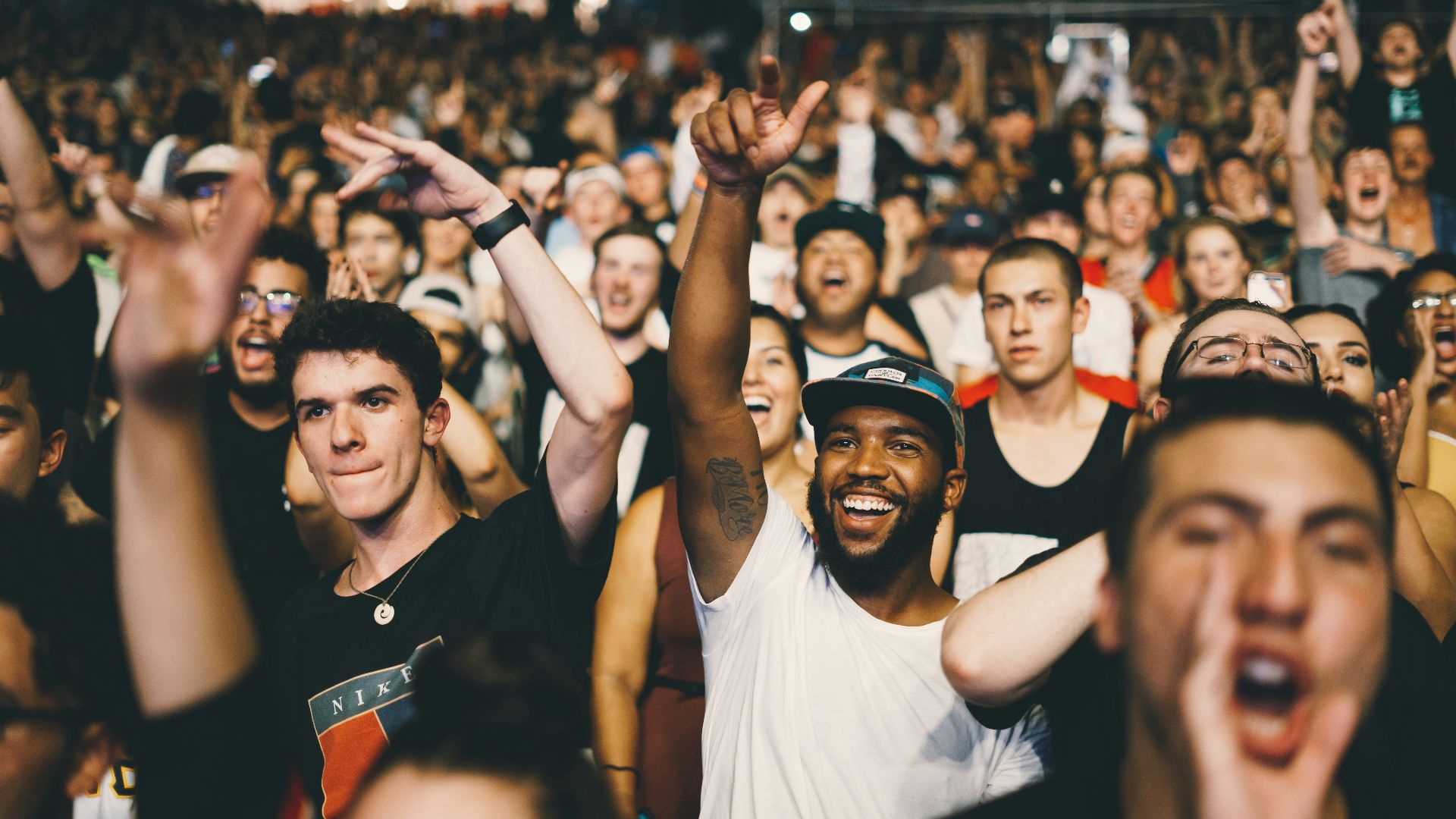shallow focus photography of man in white shirt
