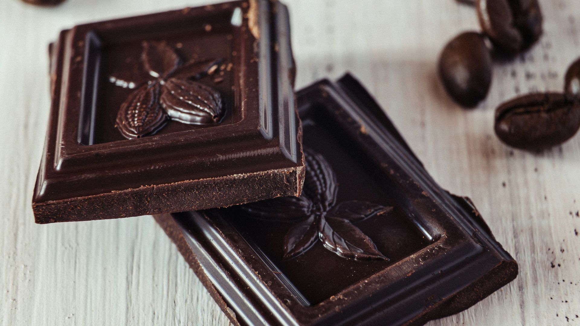 a couple of pieces of chocolate sitting on top of a table