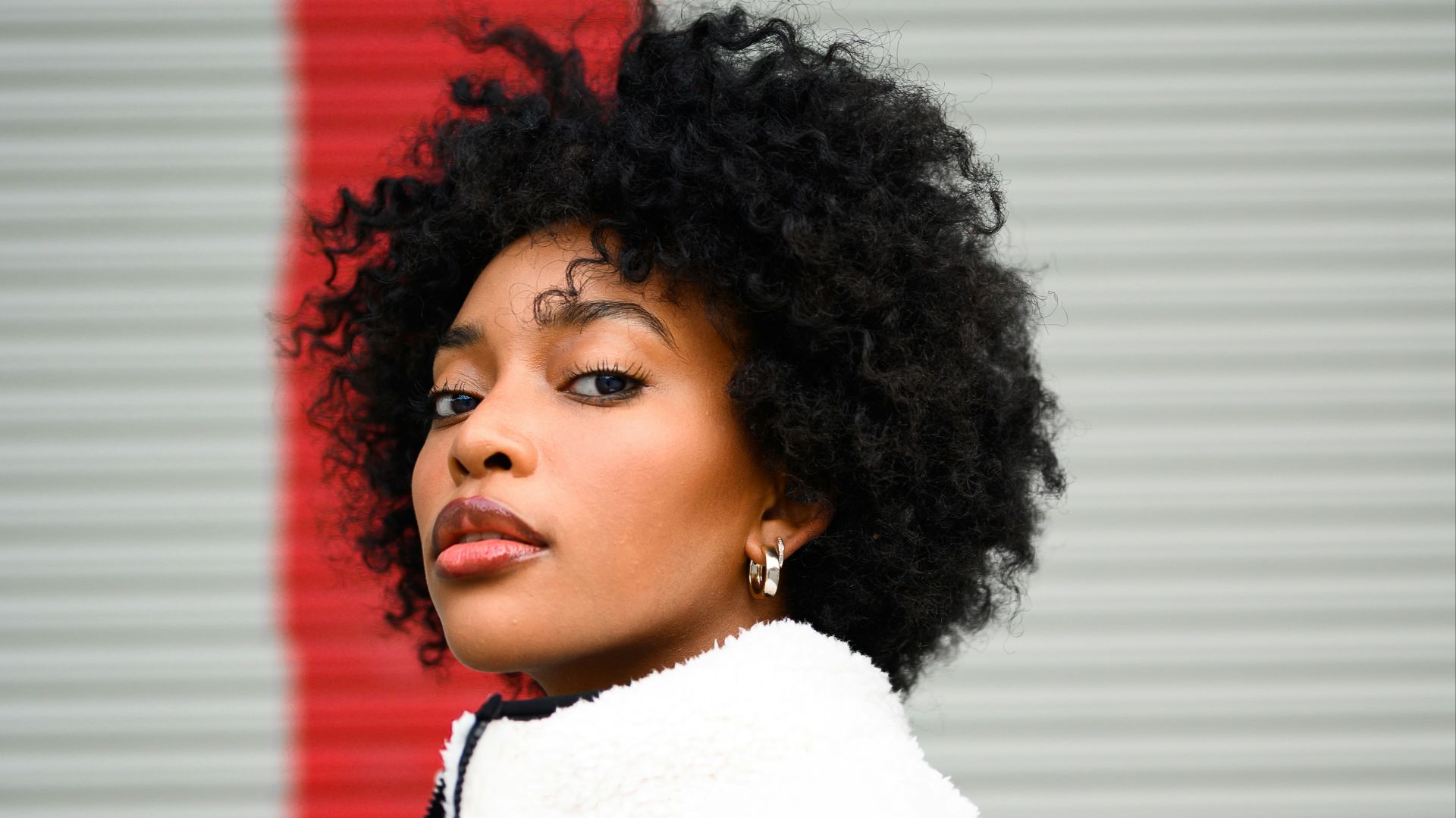 woman in white and red shirt