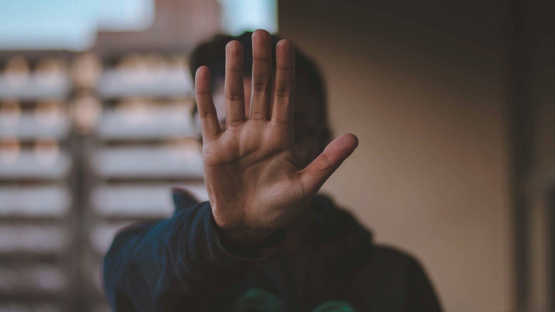 man standing while wearing black jacket