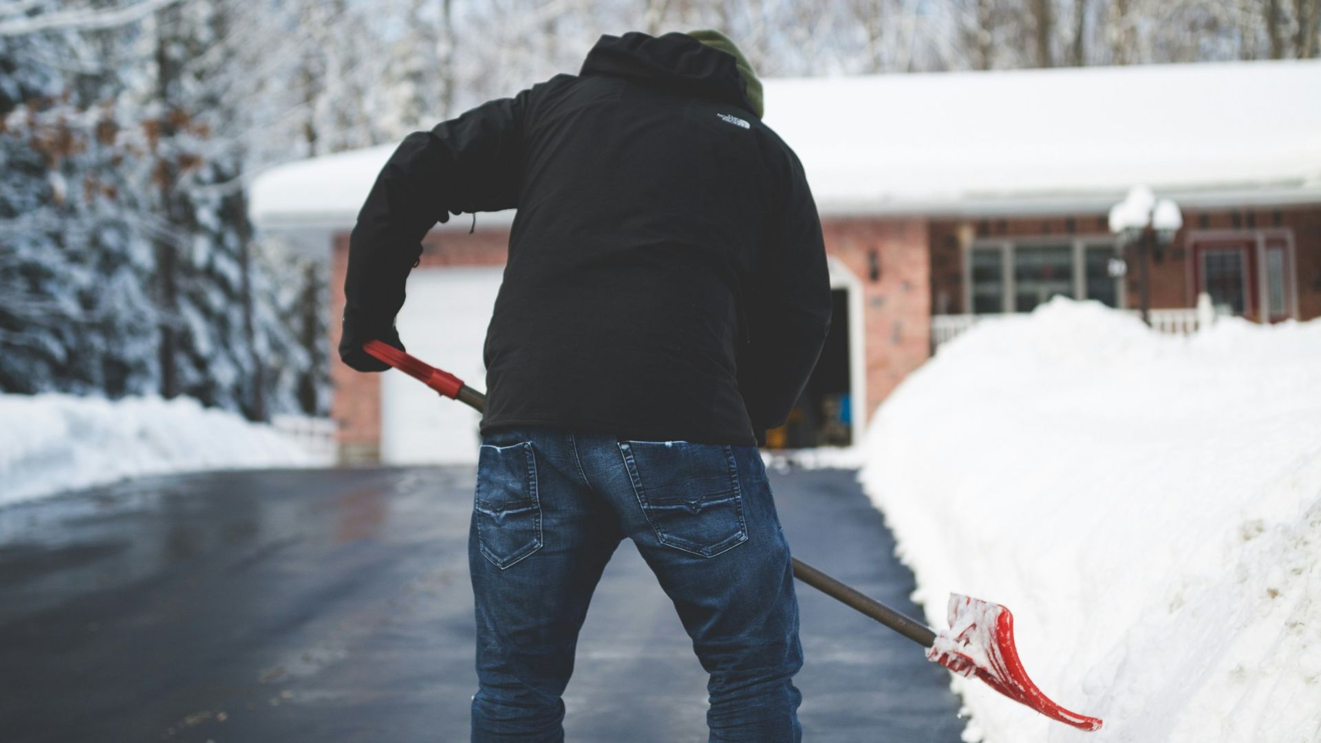 person shoveling snow