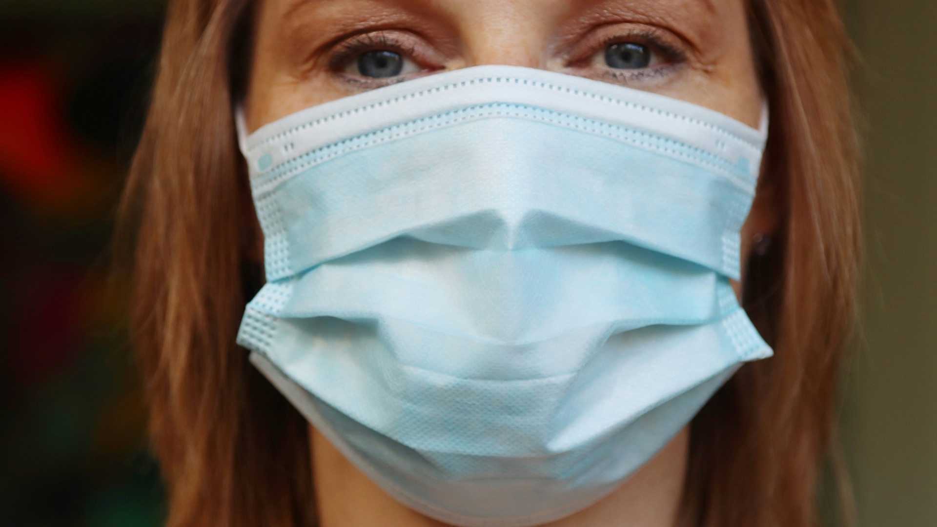 woman in white face mask