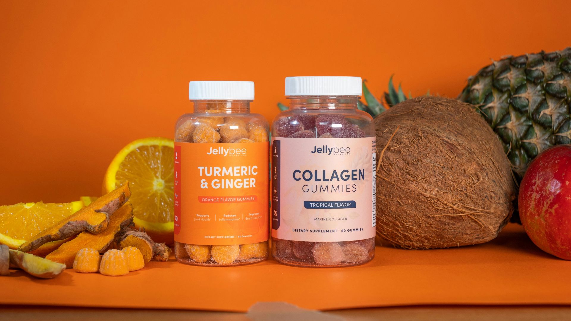 3 glass bottles on brown wooden table