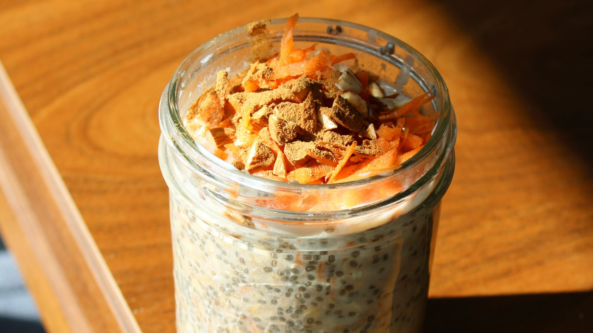 a jar of food sitting on top of a wooden table