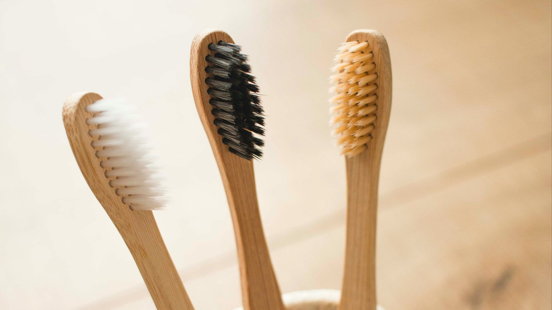 brown wooden sticks in gray ceramic bowl