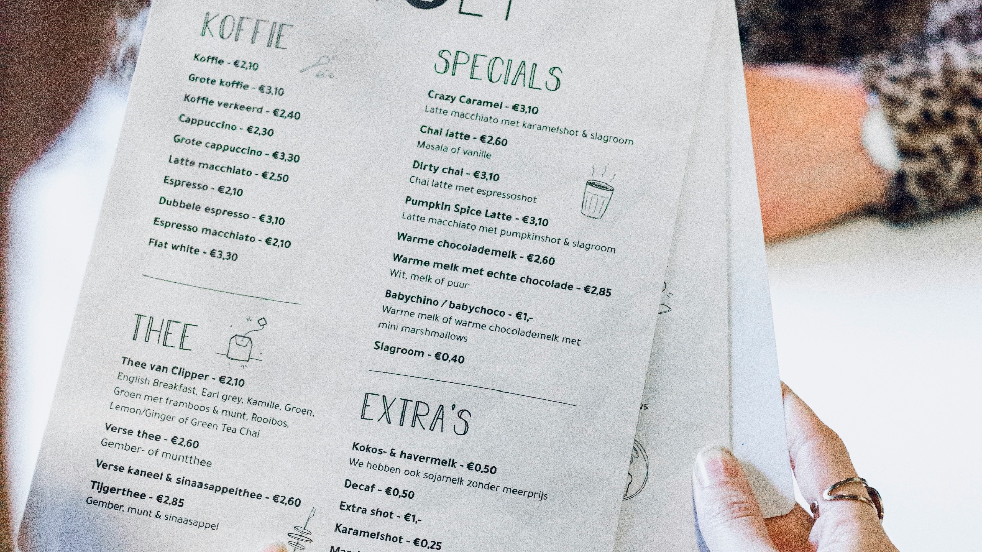 person holding white printer paper