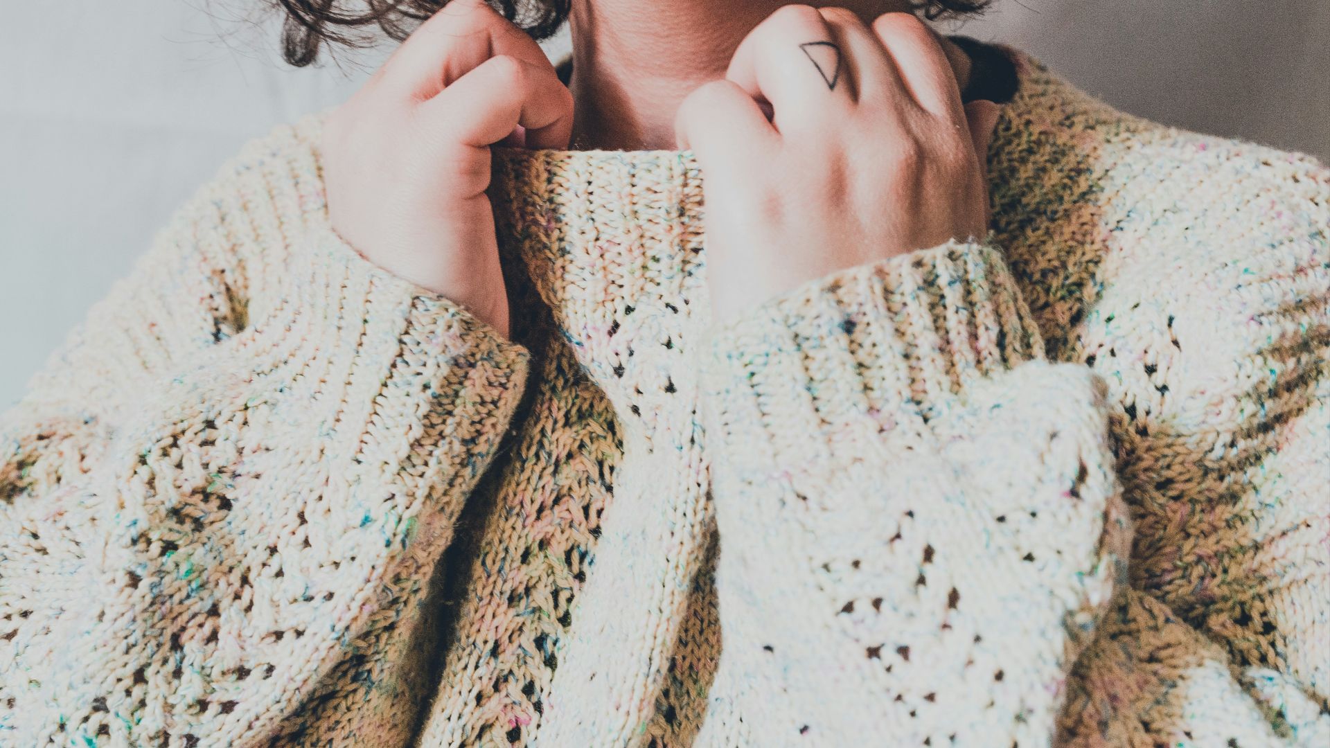 woman in white knit sweater